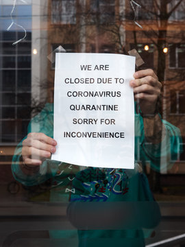 Biohazard Concept Of Living In A New Reality Of Coronavirus Epidemy Hysteria Café Owner Sticks Advertisement On Quarantine Measures To Contain Virus