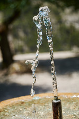 Fresh and crystalline water jet from a fountain