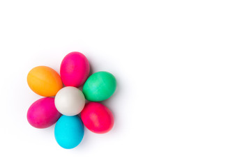 Fototapeta na wymiar Flower of Easter eggs on white background. Colored eggs. Egg hunt. Happy Easter. Copy Space.