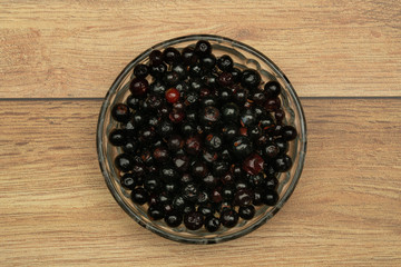 Dark blue small grapes or Vaccinium meridionale, agraz, close up.