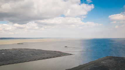 Building of new land in Amsterdam, Holland, the Netherlands by winning water from the Ijmeer lake