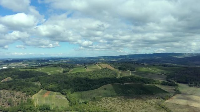 Aerial landscape beautiful green hills of vineyards of Tuscany and Piedmont, Italy. Region wine area langhe, monferrato and roero fields.