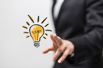 idea lamp concept in hand.