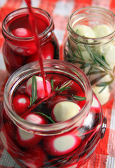 Marinated quail eggs in jars