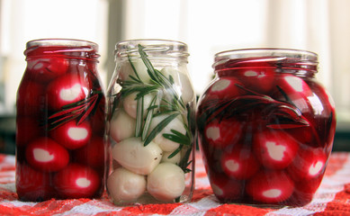 Marinated quail eggs in jars
