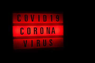 Covid-19 Coronavirus caption contept - red alert