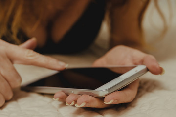 sexy girl or woman with mobile phone