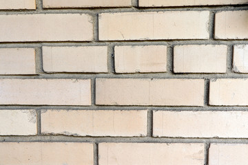 A light  brick wall texture, background, pattern.