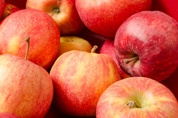 Fototapeta na wymiar Red apples close up. Fuji apple variety