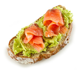 slice of bread with avocado and salmon