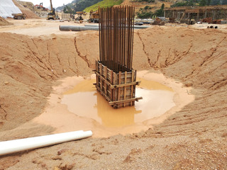 Pile cap and column stump under construction at the construction site. Constructed using reinforced concrete with plywood timber as a form work.