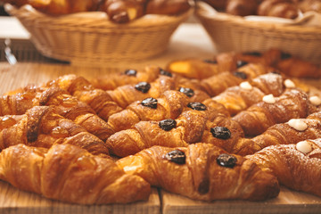 Various flavours of croissant in a bakery