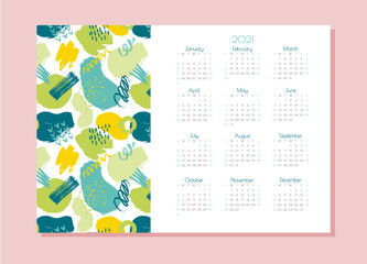 vector one-page horizontal calendar for 2021. Editable and printable template with bright abstract elements: paint strokes, stripes, spots, dots. Planner.