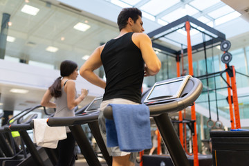 Obraz premium People running on the treadmill in a gym
