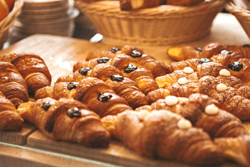 Various flavours of croissant in a bakery