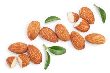 Almonds nuts with leaves isolated on white background with clipping path and full depth of field....