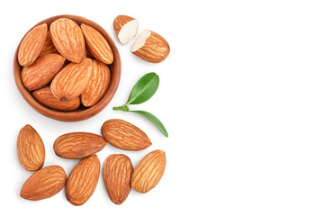 Almonds nuts with leaves isolated on white background with clipping path and full depth of field. Top view with copy space for your text. Flat lay