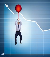 Businessman flying on hot balloon over graph