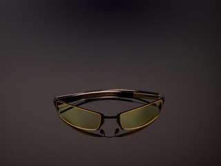 Computer game protective UV glasses on a gray gradient background