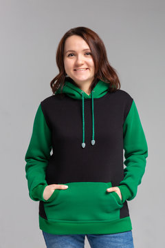 Woman In Black And Green Hoodie, Mockup For Logo Or Branding Design