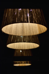 Three straw lamps