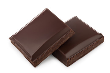 Small dark chocolate pieces isolated on white background with clipping path