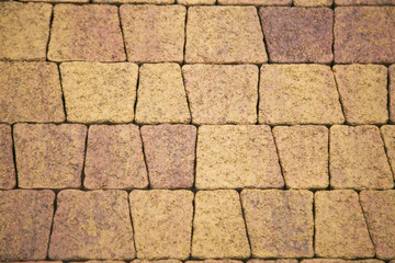 Background of stone tiles, yellow and orange