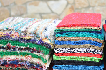 colorful carpets and fabrics in market ideal for background
