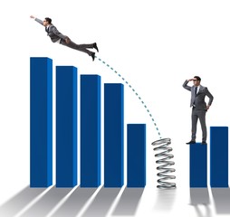 Business people jumping over bar charts