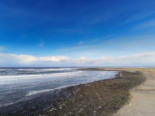 Atlantic ocean, Strandhill beach, Aerial view, Cloudy sky, sunny day, Powerful waves in the ocean, county Sligo Ireland.
