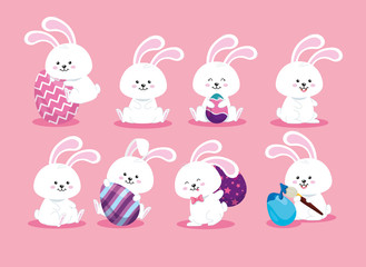 Obraz na płótnie Canvas group of cute rabbits and eggs easter vector illustration design