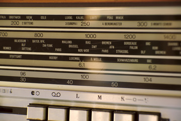 Radio stations display of an old vintage radio. Close up.