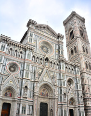 Basilica del Santa Maria del Fiore and Companile di Giotto, Bell Tower on Piazza del Duomo in Florence, Italy;.front marble facade
