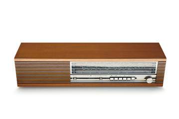 Old vintage radio In wooden case, retro style. White background.