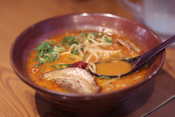 Bowl of red ramen in a Tokyo restaurant