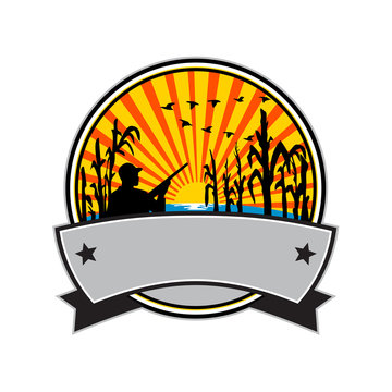 recommend clip art: Retro style illustration of a duck or bird hunter with rifle in flooded cornfield with corn stalks set inside circle with sunburst on isolated background.