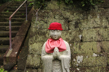 Smiling Buddha statue in Kamakura, Japan