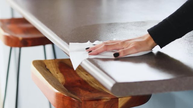disinfecting surfaces from bacteria or viruses, hand cleaning bar table with disinfectant wet wipe