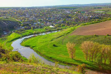 village situated on the riverside , spring scenery 