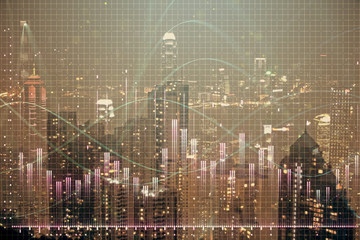 Double exposure of forex chart drawings over cityscape background. Concept of success.