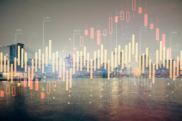 Financial graph on night city scape with tall buildings background double exposure. Analysis concept.