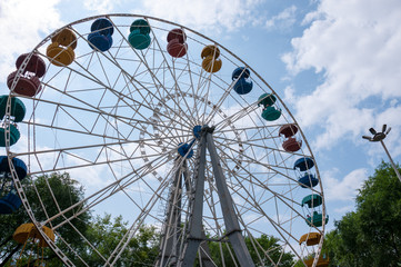 Russia, Blagoveshchensk, July 2019: Summer. Ferris wheel in the city Park of culture and recreation in the center of Blagoveshchensk