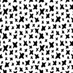 Black paint crosses vector seamless pattern. Decorative hand drawn letters X freehand illustration.