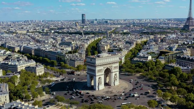 PARIS, FRANCE - MAY, 2019: Aerial drone view of Triumphal Arch and and Eiffel tower in historical city centre.