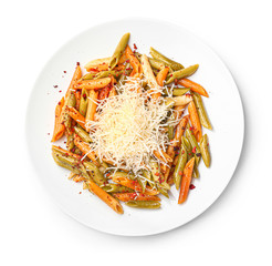Plate with tasty pasta and cheese on white background