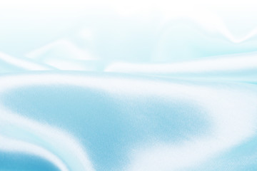 Smooth elegant blue silk or satin texture can use as abstract background, fabric