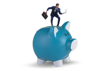 Businessman in debt concept with piggybank