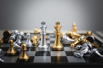 Chess figure king surrounded by falled pawn chess. Business strategy, leadership, success achievement, competition organization concept.