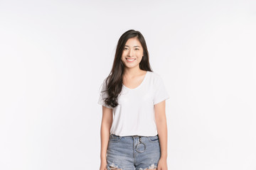 Young Asian girl Smiling, woman Portrait isolated on white background. The lady in a summer t-shirt Short jeans. Copy space