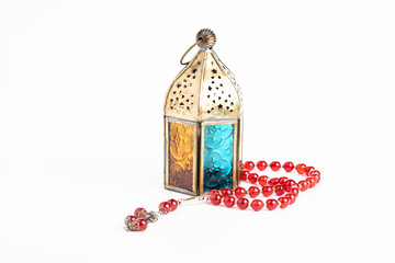 Arabic lantern and Tasbih (Rosary Beads)  isolated on white